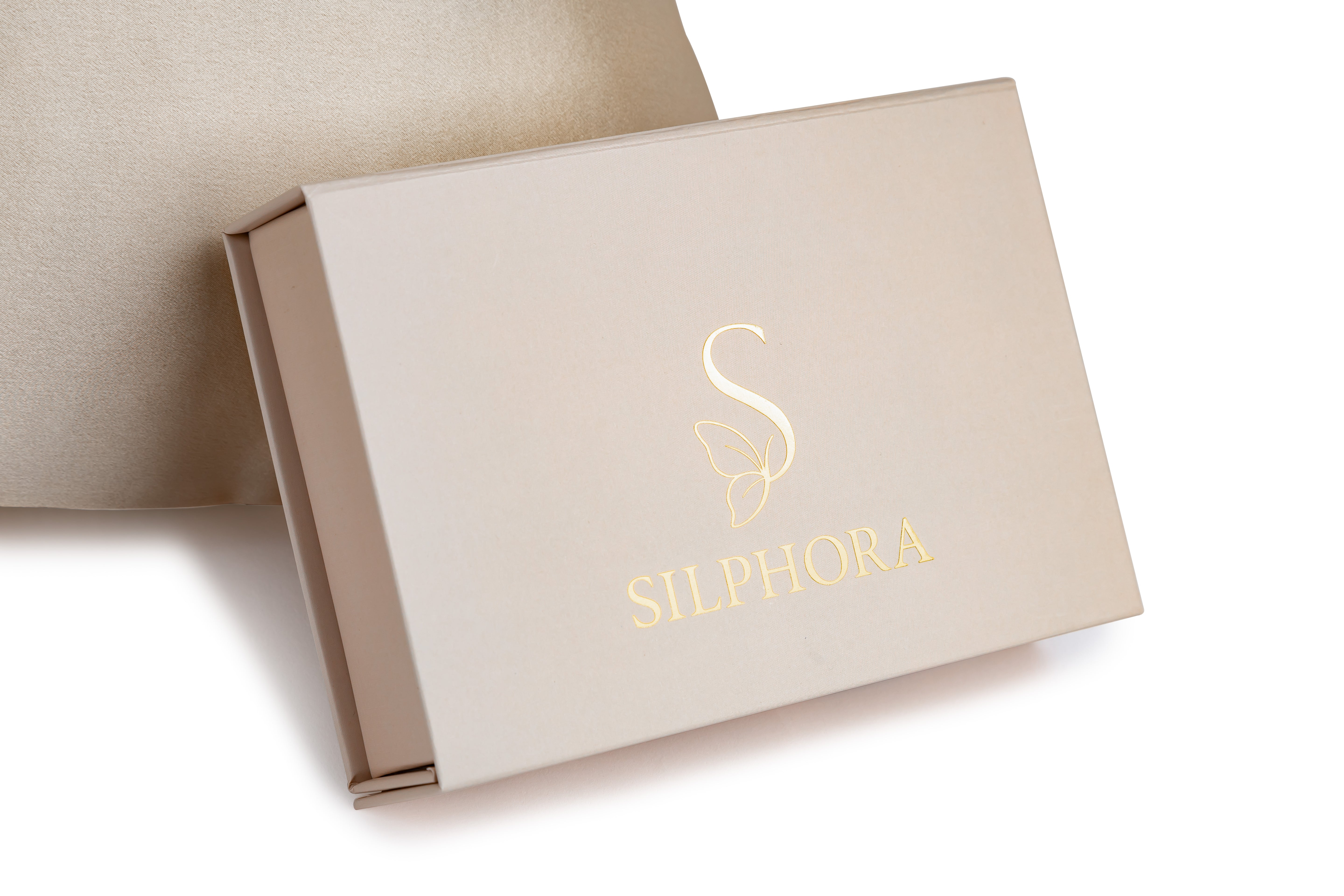 Champagne Glow silk pillowcase made from 100% mulberry silk for smooth hair and glowing skin
