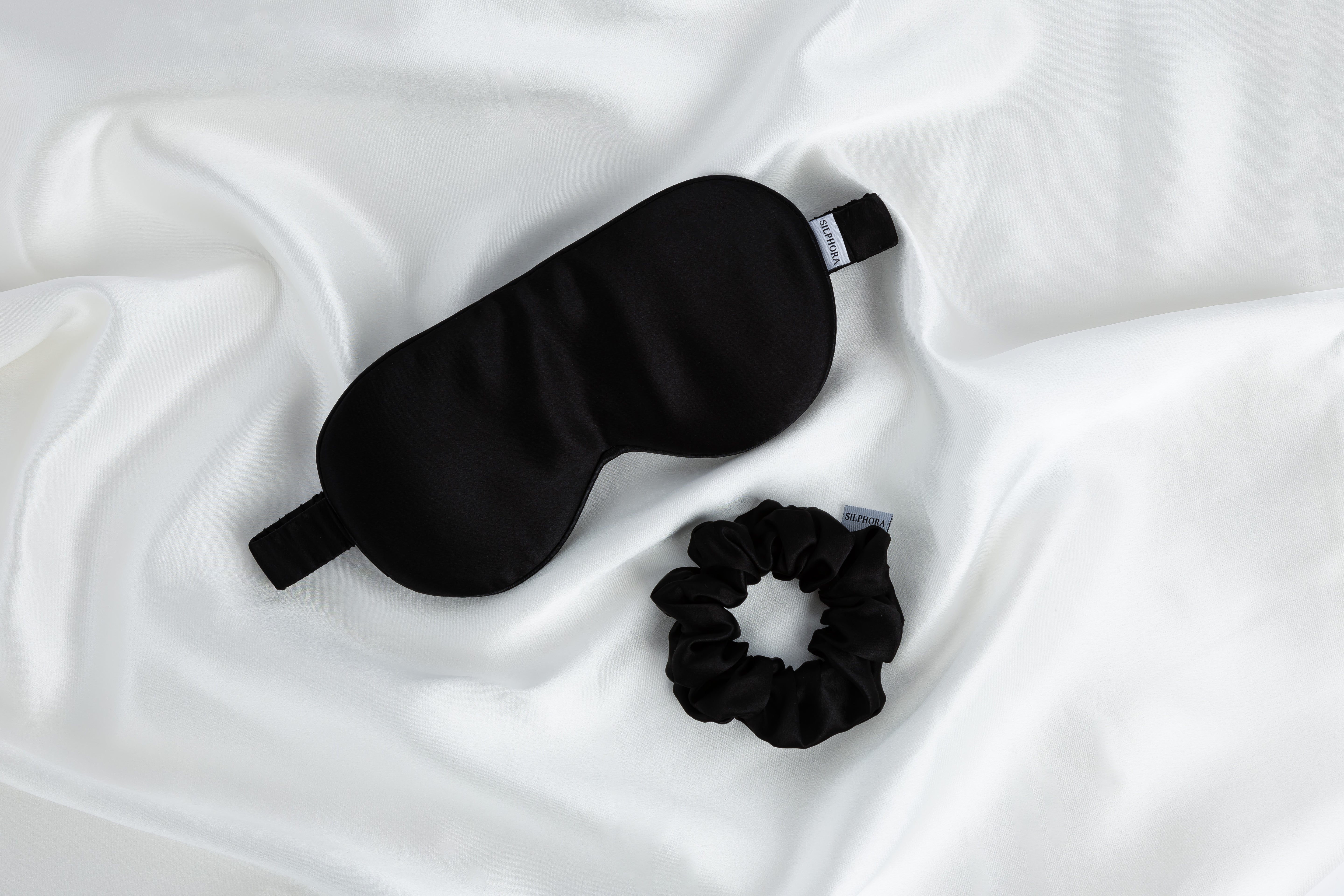 Midnight Black silk gift set including pillowcase, eye mask, and scrunchie, made from 100% mulberry silk for smooth hair and glowing skin, presented in an elegant gift box
